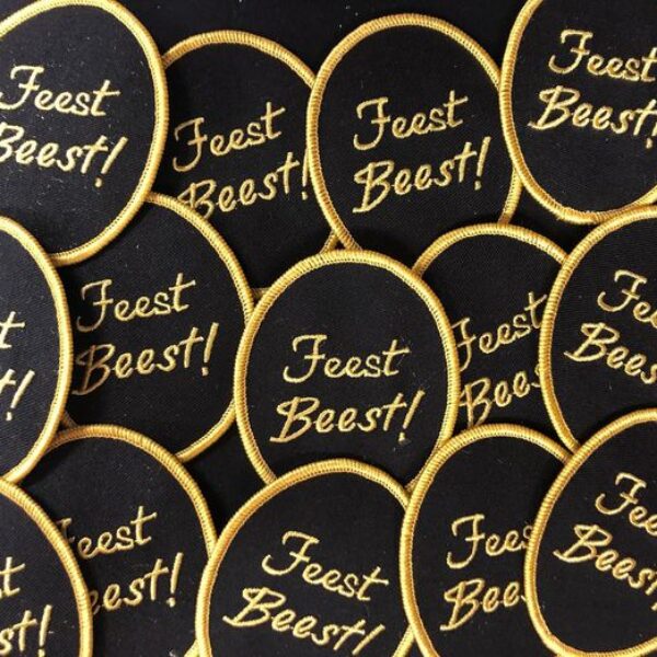 Embleem feestbeest zwart goud