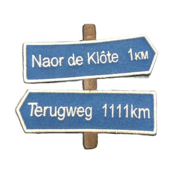 Embleem wegwijzer naar de klote
